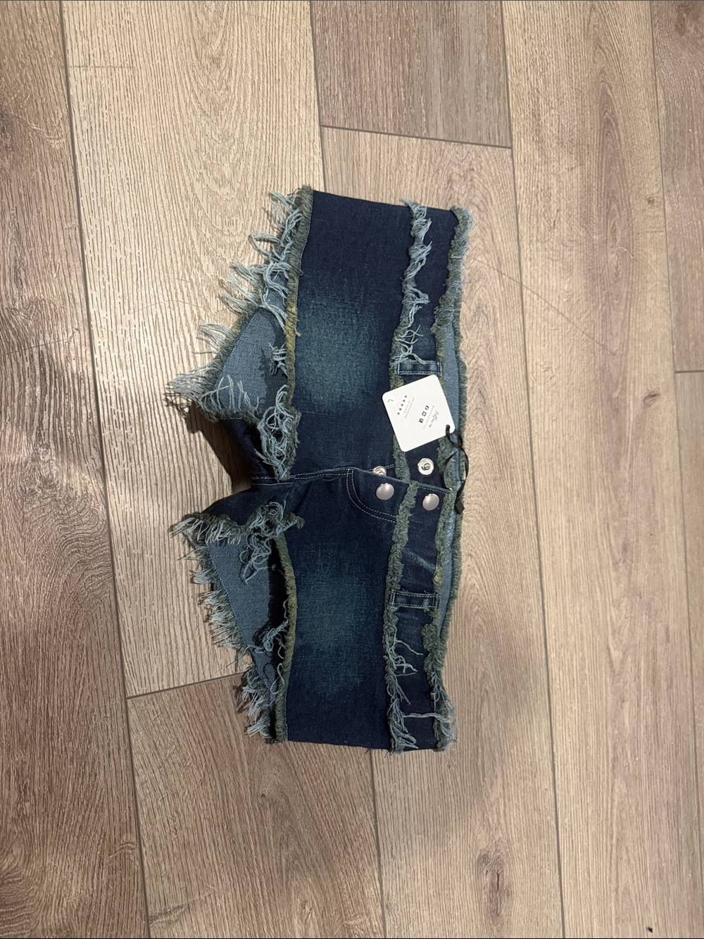 Dark Blue Frayed Denim Shorts with Low-Rise Fit